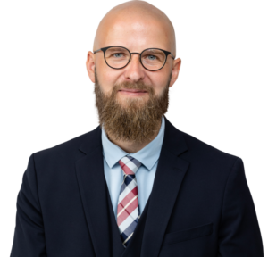 Lasse Andersen Bedemand i slips og jakkesæt